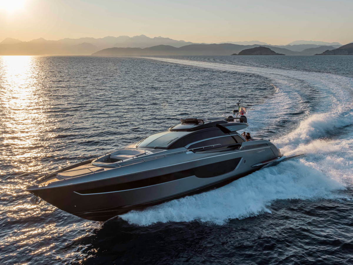 Luxury yacht cruising at sunset